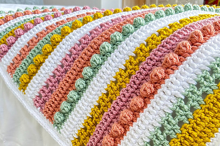 colorful bobbles and filet crochet blanket - free pattern