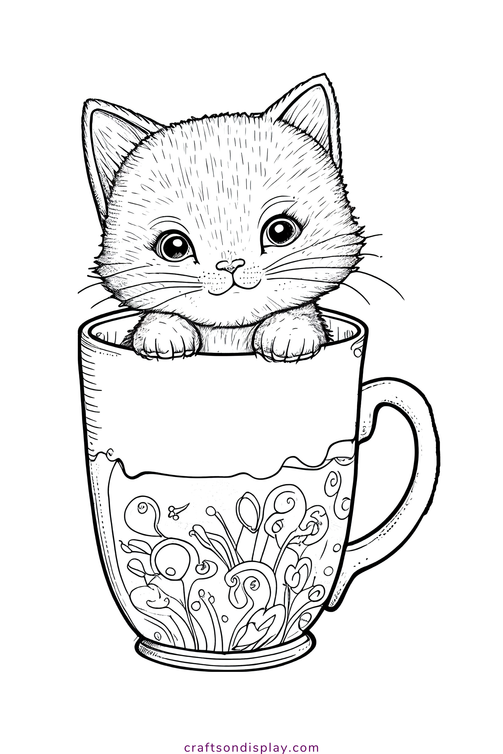 Cute kitten in a mug - Crafts on display