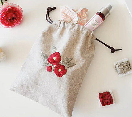 DIY drawstring bag with hand-embroidered flowers