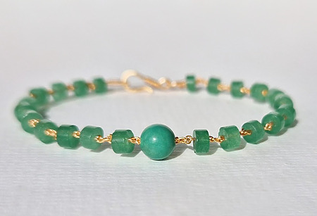 DIY bracelet with soft copper wire and green beads