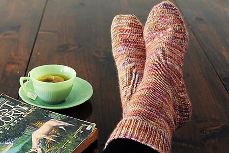 woman's feet in knit socks