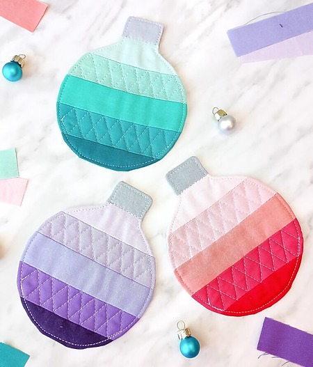 ombre quilted coasters, shaped like Christmas ball ornaments