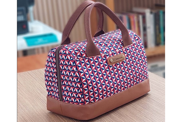 DIY small handbag made with canvas fabric and vinyl accents