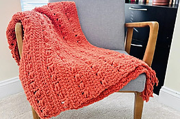 DIY cozy crochet blanket with super bulky yarn