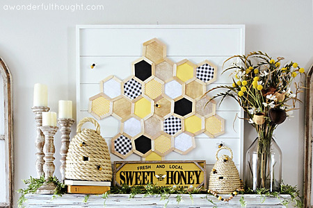DIY summer honeycomb backdrop with craft sticks and scrapbook paper