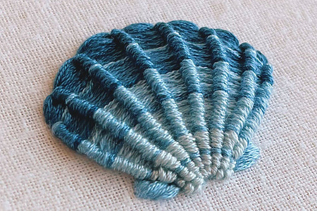 Learn Whipped Spider Web stitch with this free seashell embroidery pattern