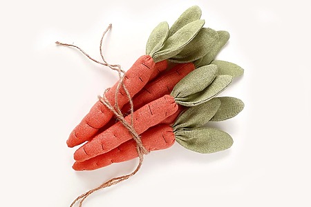 AltoysDIY Carrots: A bundle of orange fabric carrots with green leaves tied together with a rustic string