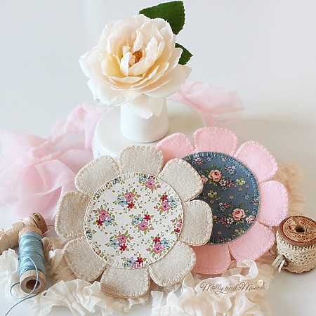 Felt Flower Coaster: A round drink coaster shaped like a flower with decorative embroidery and layered felt petals