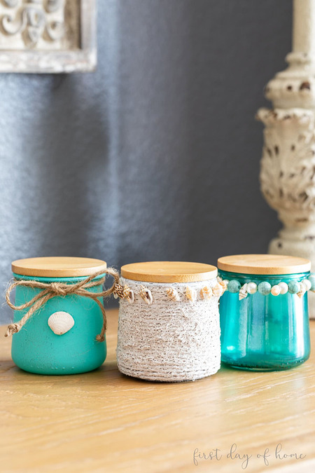 Free coastal glass jars upcycle tutorial - DIY beachy painted glass jars with shells