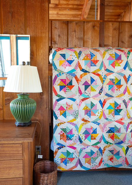 Free Lucky Spin quilt pattern - Easy DIY scrap rainbow FPP quilt by Modernly Morgan