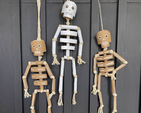 Free recycled DIY Halloween decor tutorial - How to make a cardboard tube skeleton for Halloween